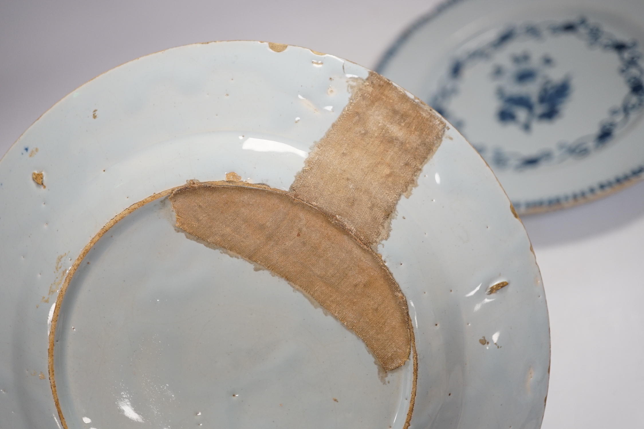 Two 18th century Delft plates and a 19th century Masons ‘Crown Inn’ plate-24cm diameter